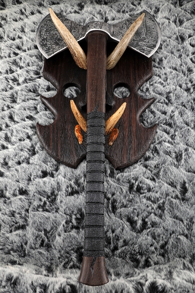 Axe-axe with traces of forging wenge carved on a stand